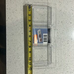 3 plastic organizers by Essentials.  All three are identical. Made in China.